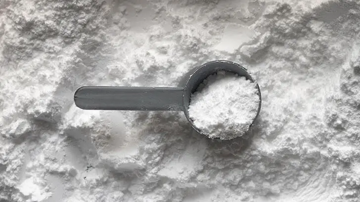 Scoop Laying in Creatine Powder